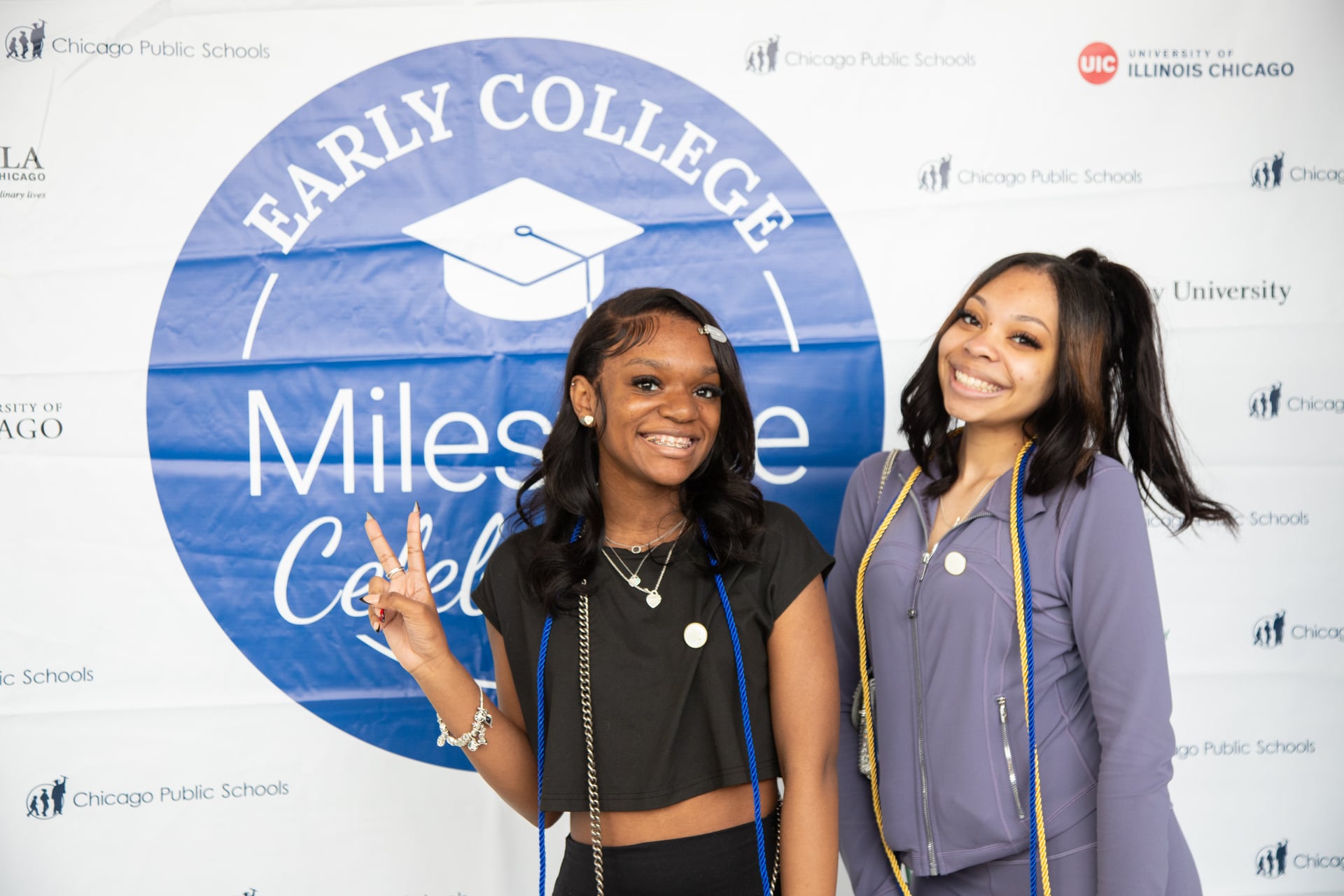 Image of two graduates