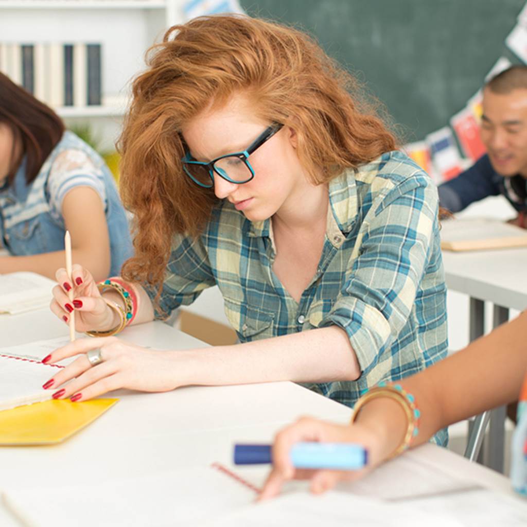 A student studies in a classroom