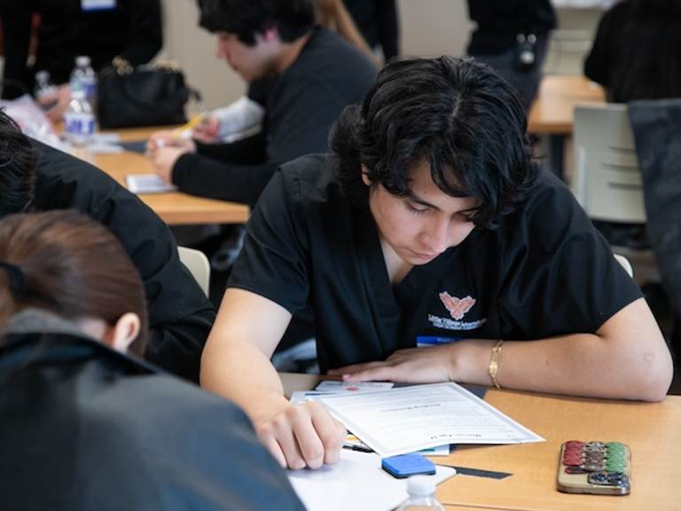 A student participates in an academic competition