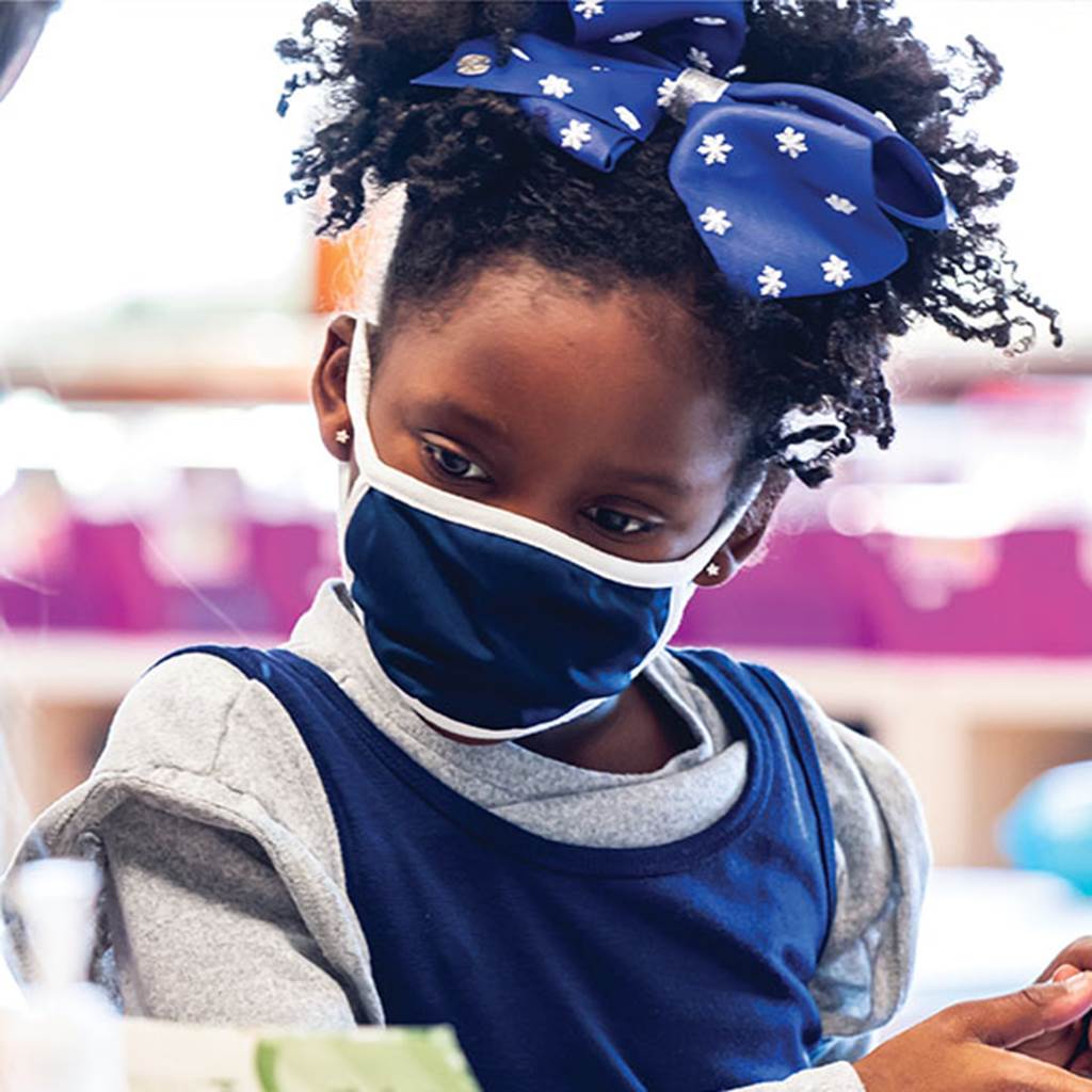 Image of a young student wearing a face mask