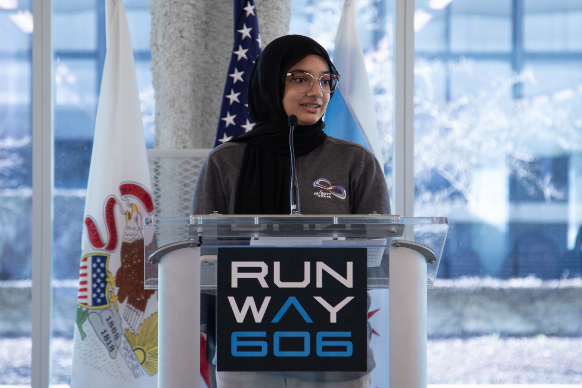 Fatima speaking at a Runway 606 event