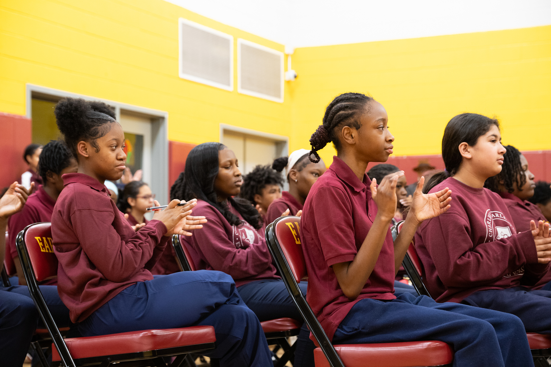 image of students applauding