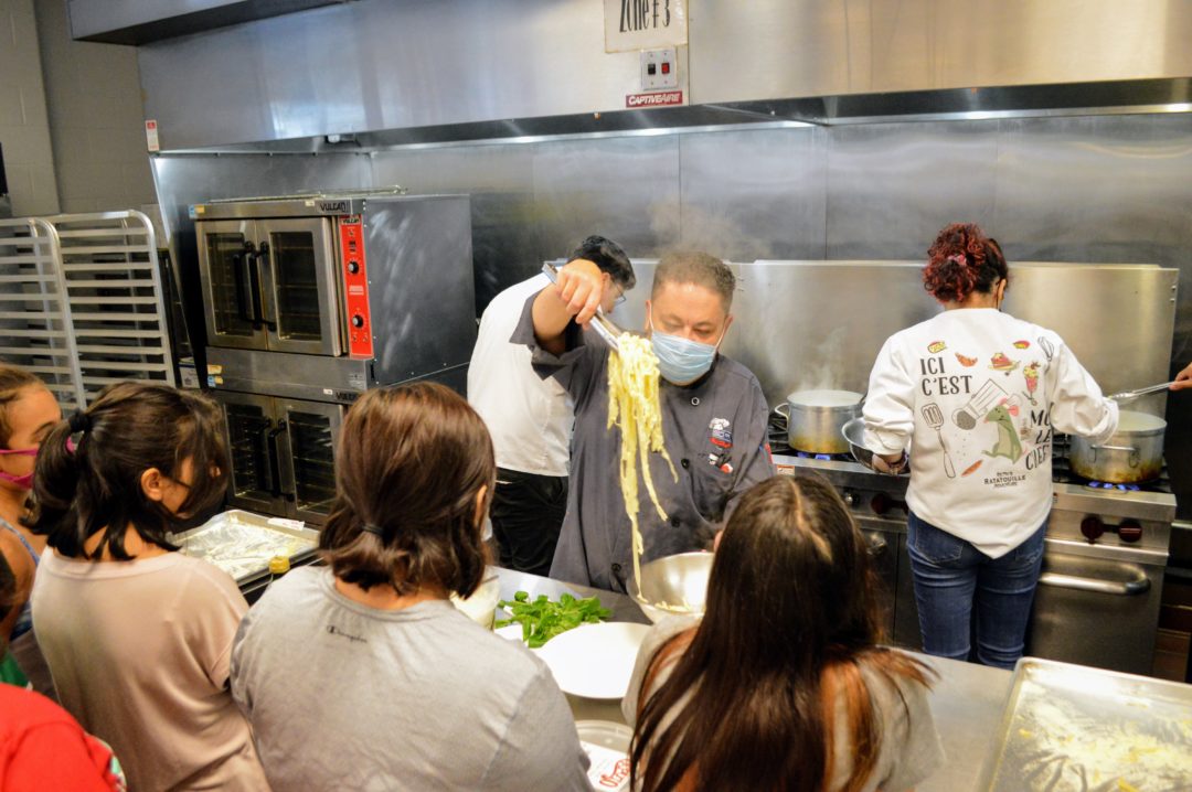 image of students in large kitchen