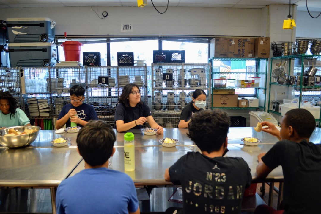 students at a kitchen table