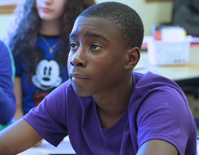 A student listens in class
