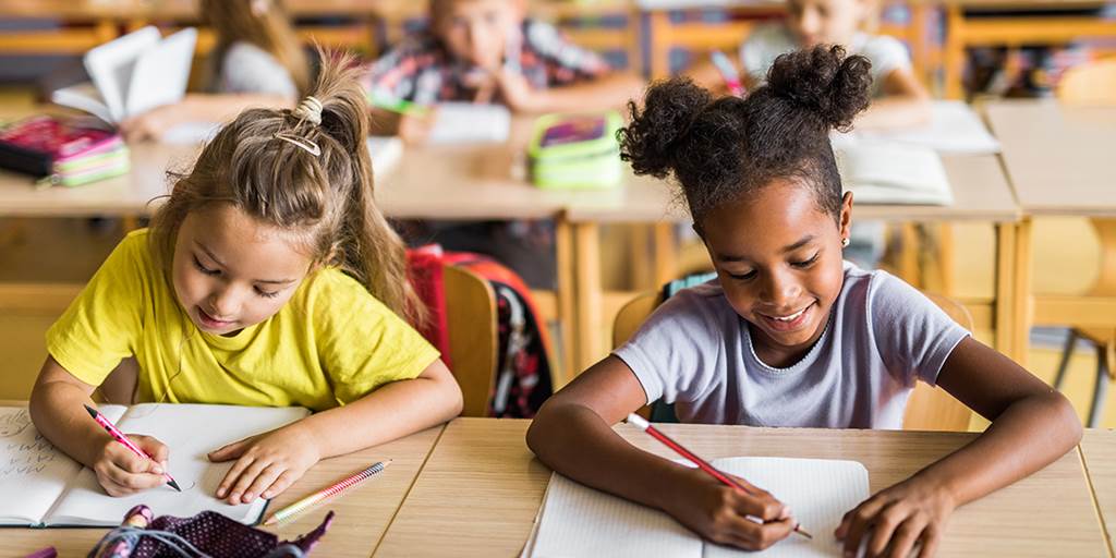 smiling student reading