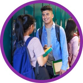 Students talking next to their lockers