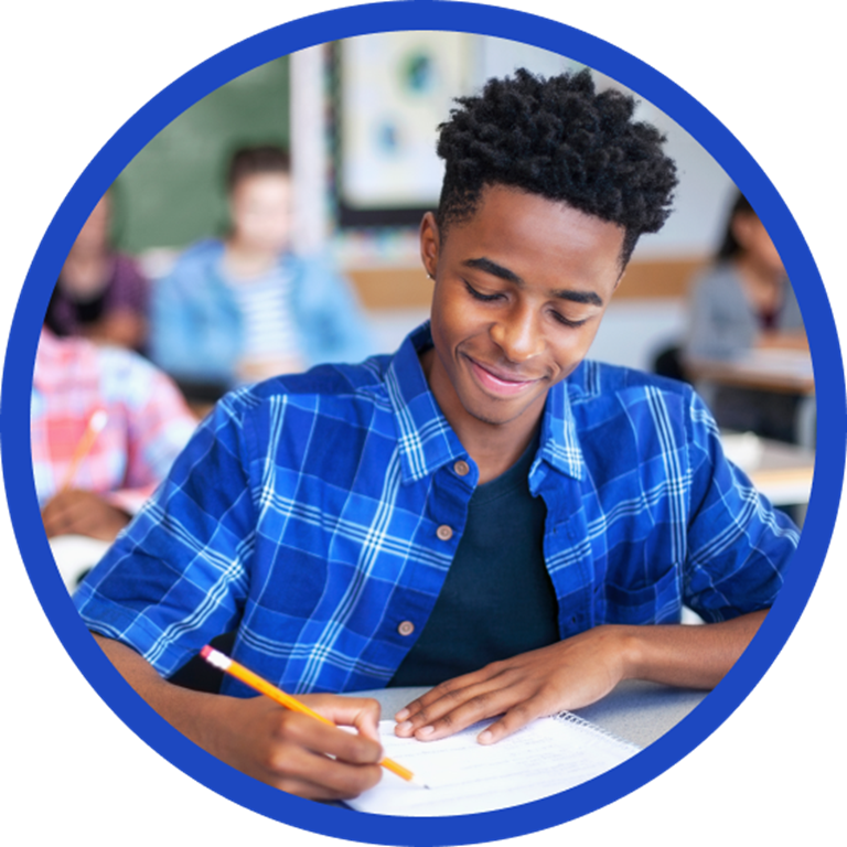 Student taking notes in a notebook