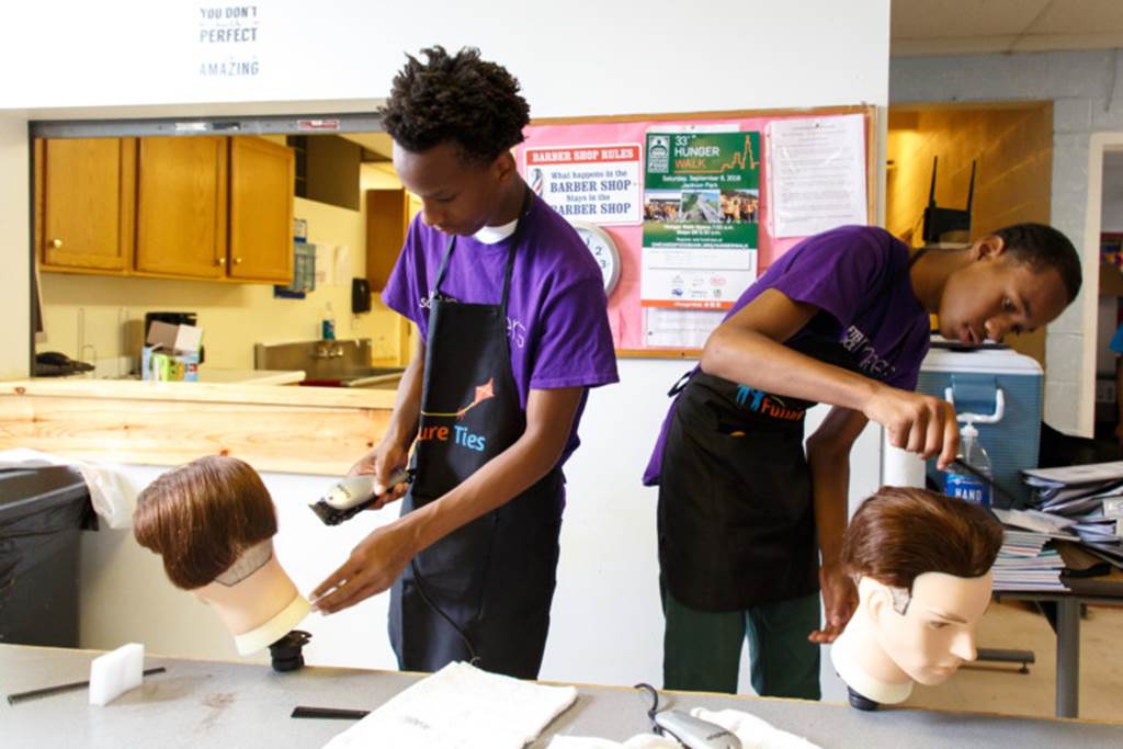 Students practicing on mannequins
