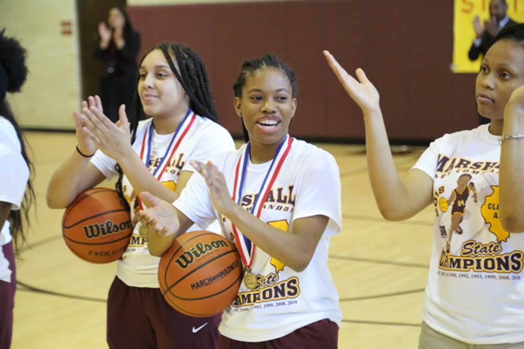 Marshall girls basketball team clapping