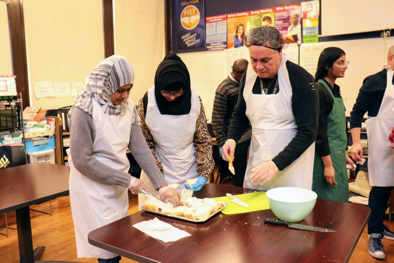 community workers preparing food