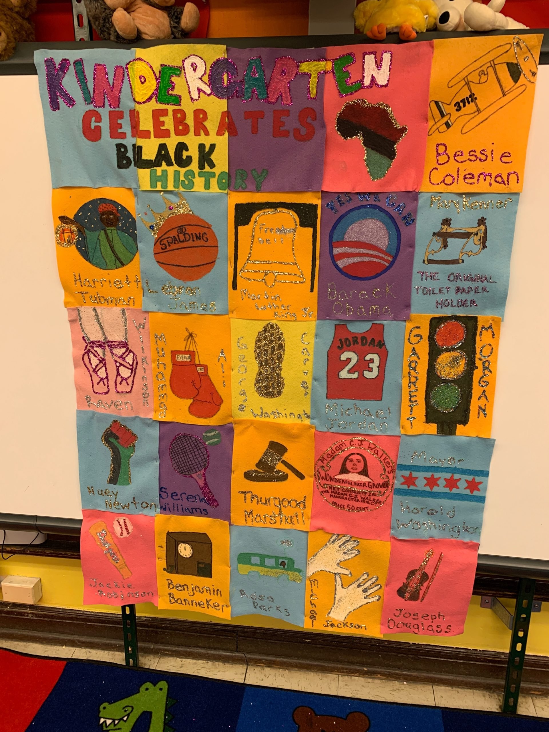 A quilt made of student artwork