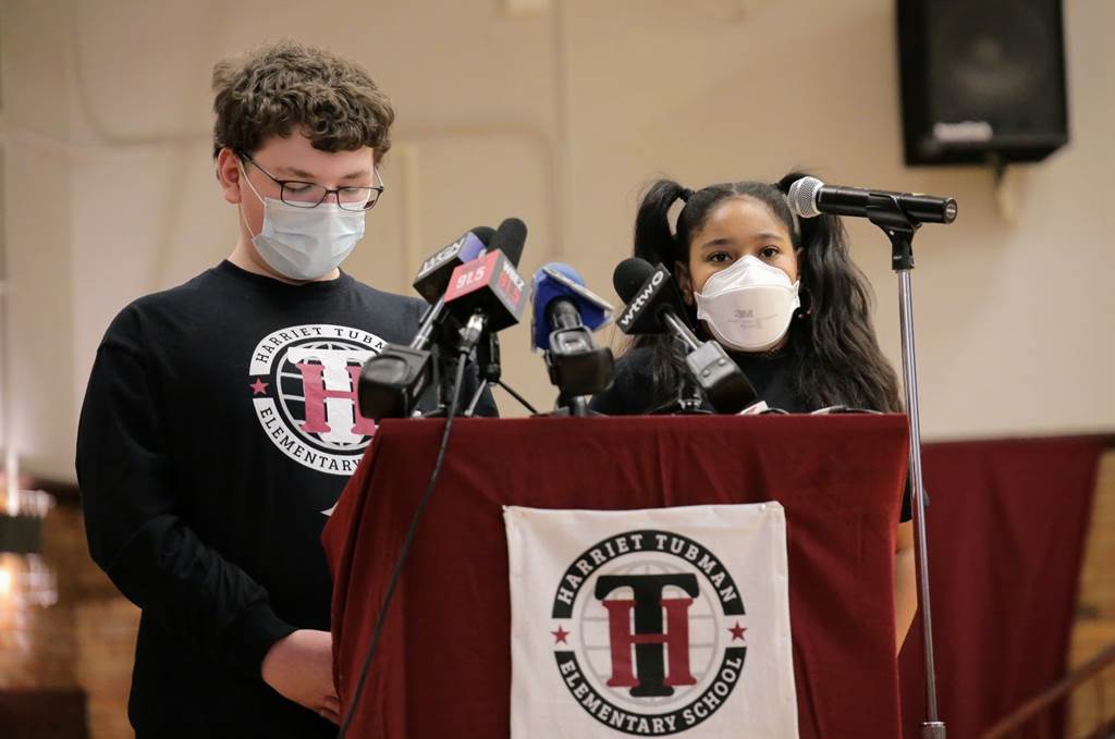 Harriet Tubman Elementary School - Two students standing at a podium